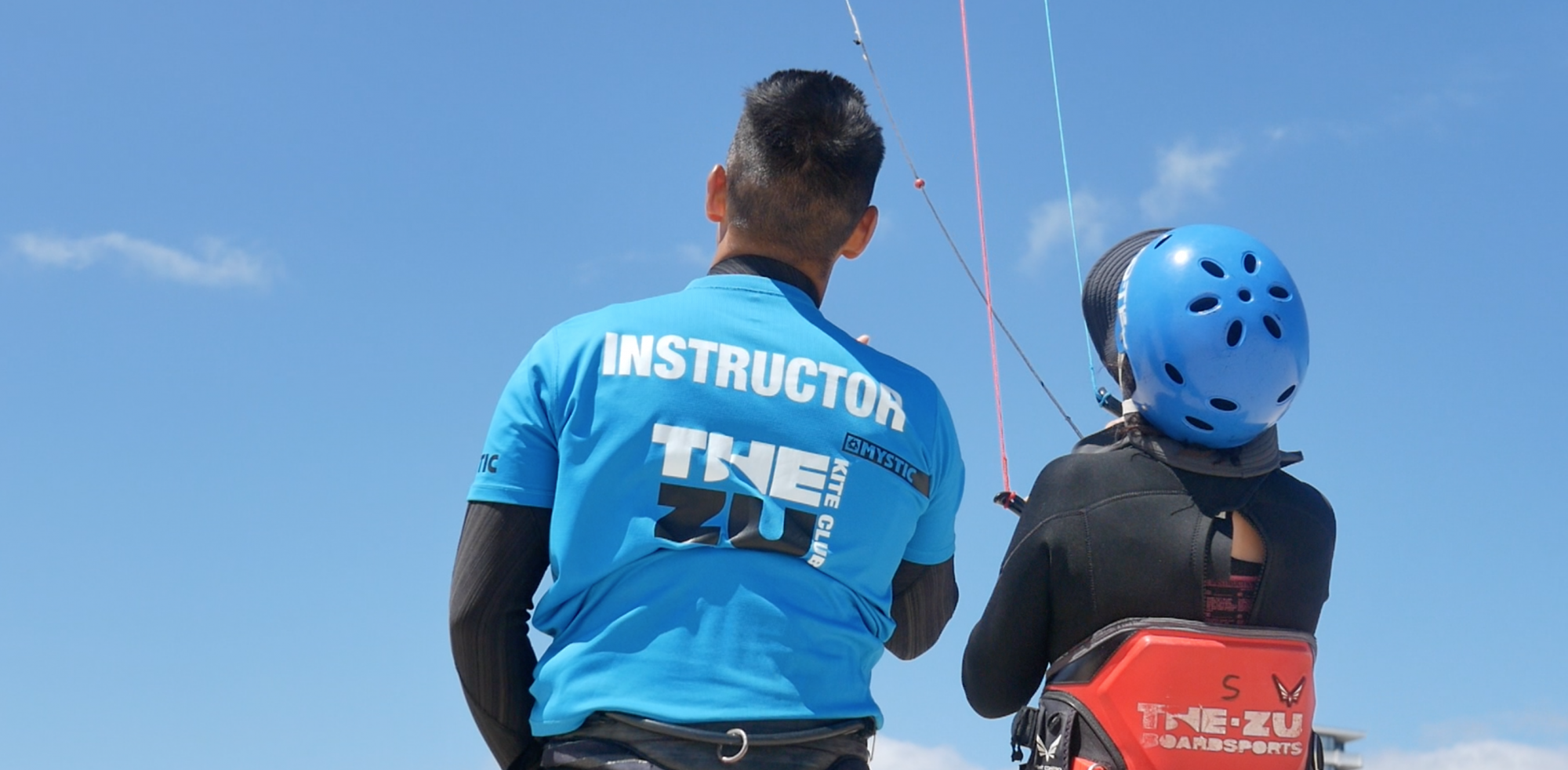 Trainer kite lesson on beach